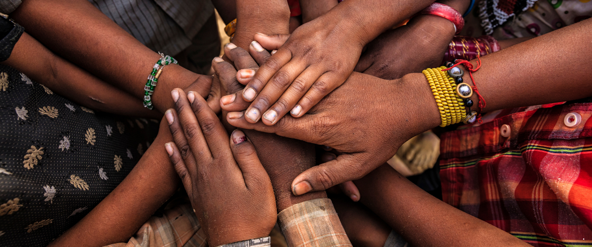 Hands joined in community
