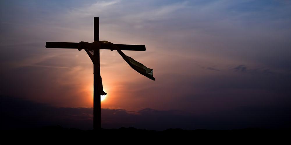 Cross at sunset — faith illustration