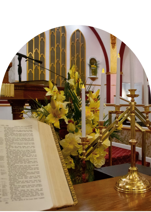 Sanctuary flowers and communion table